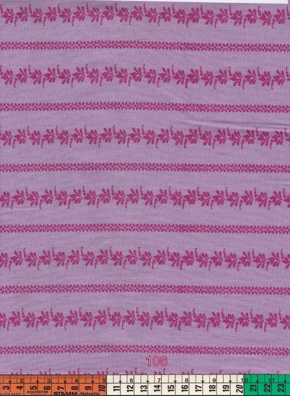 Lila alapon népies minta csíkban