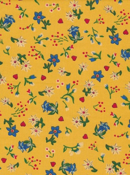 Sárga alapon kék virág piros szívvel