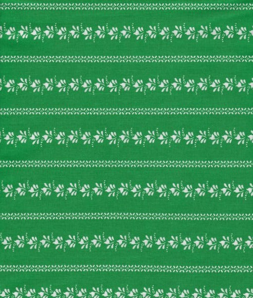Zöld alapon fehér népies minta csíkban